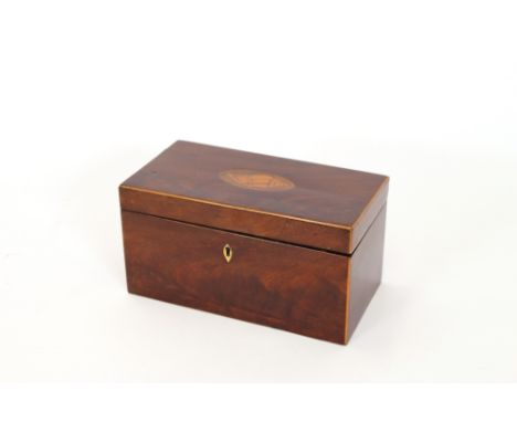 An early 19th Century mahogany and satinwood strung three compartment tea caddy, the hinged lid inset with a conch shell pate