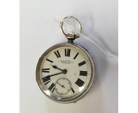 An H. L. Brown silver hallmarked pocket watch, having white enamel Roman numeral dial with seconds subsidiary dial, case stam