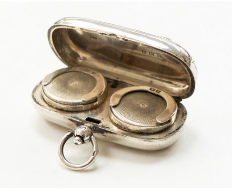 An Edwardian silver oval engine turned sovereign holder, Colen Hewer Cheshire, Birmingham, 1910 