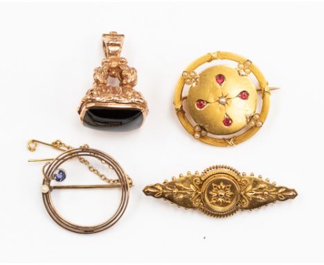 A 9ct rose gold seal fob set Whitby Jet; together with a 15ct brooch, circular brooch set amethyst and pearl and yellow metal
