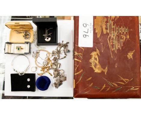 A collection of costume jewellery stored within a Chinese red lacquer tea caddy, to include sterling silver pendant and earri