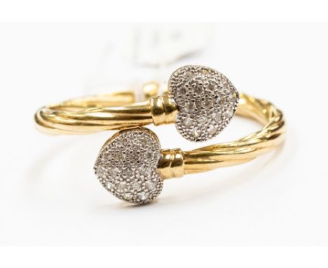 A 9ct gold cz set stylised snake bangle, with two diamond set heart details, total gross weight 14.9 grams approx a/f