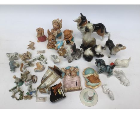 A collection of Pendelfin rabbits, Wade whimsies, German ceramic animal figures, etc, Goebel 