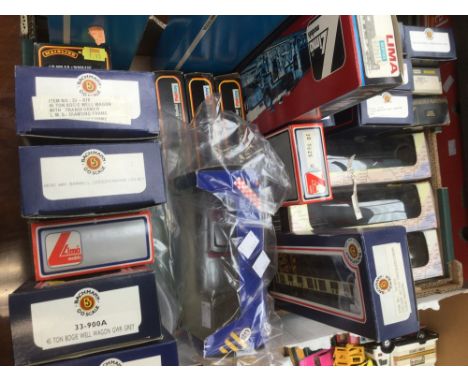One box of assorted rolling stock and coaches to include Bachmann, Airfix, Mainline etc.