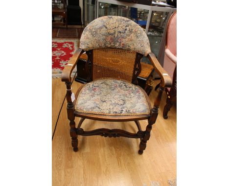 An early 20th Century canework tub chair, a canework backed armchair, both circa 1920 and an oak joined stool (3)