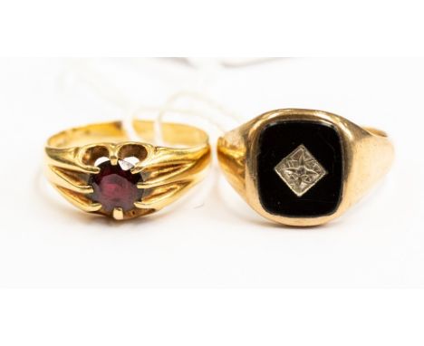 Two gentleman's rings, comprising an onyx and small diamond seal type, 9ct gold ring,  and a ruby ring 18ct gold, size R (2)