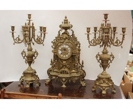A brass clock garniture set large clock and candelabra, approx 60 cm high, Roman numerals to clock dial (3) 