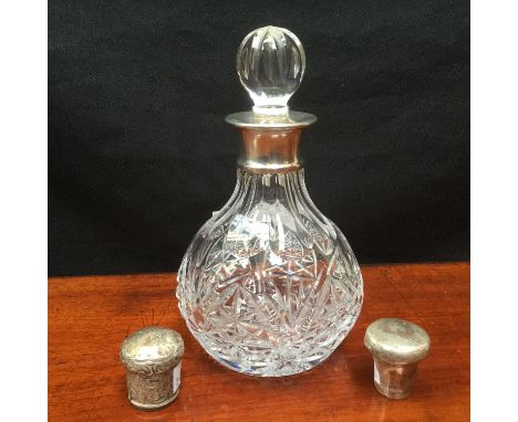 A squat cut glass decanter and stopper with silver collar Birmingham 1895, possibly Stourbridge glass, together with two silv