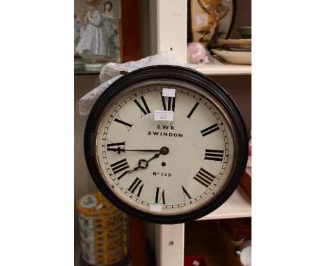 A Great Western Rilaway Swindon wall clock, No. 192, circular base and white dial