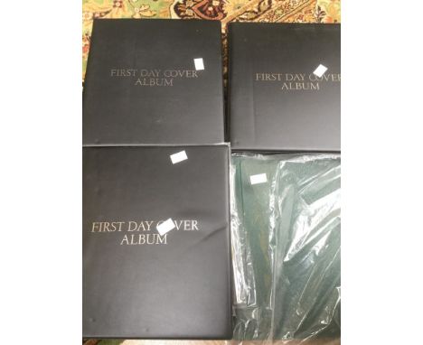 Three albums of mint GB stamp packs (approx. 140), and an album of mainly mint Commonwealth. (4)