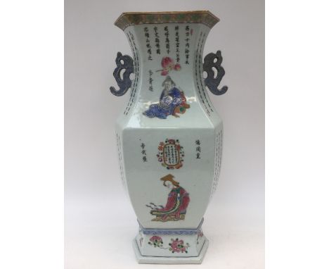 A large Chinese 19th Century, late Qing Dynasty, 1644-1912 twin handled hexagonal waisted "Wu Shuang Pu" vase decorated with 