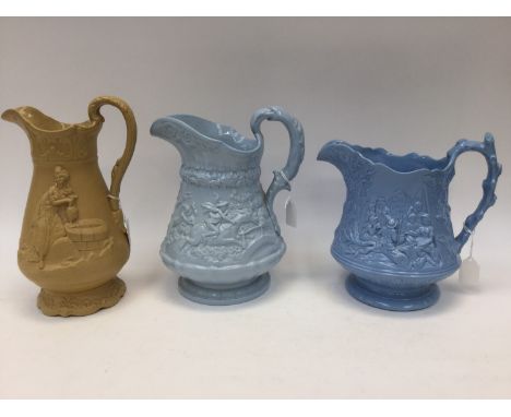 A Staffordshire relief moulded jug, Arabic pattern, together with another with campfire scene and a Ridgway Tam o Shanter des