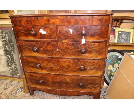 A mid Victorian mahogany chest of drawers, of large proportions, fitted with two short over three long graduated drawers, sta