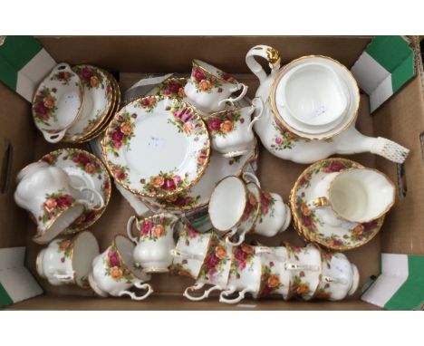 A large quantity of Royal Albert 'Country Roses' pattern china to include: twelve tea plates, twelve saucers, twelve cups, on