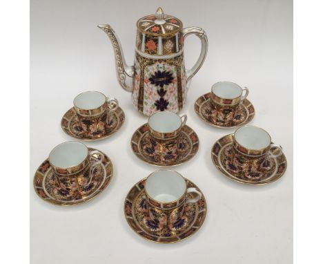 A Royal Crown Derby Imari 1128 pattern coffee set, comprising coffee pot, six coffee cans and six saucers, early 20th Century