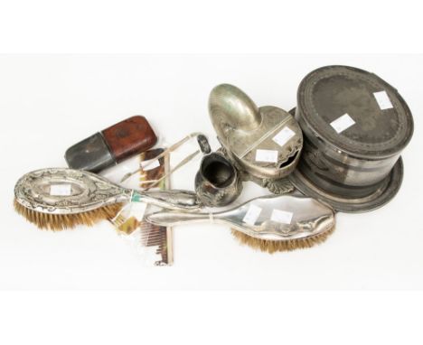 A nautilus shell shaped spoon warmer, a tea caddy, a Britannia metal cream jug, hip flask, two silver backed brushes, comb an