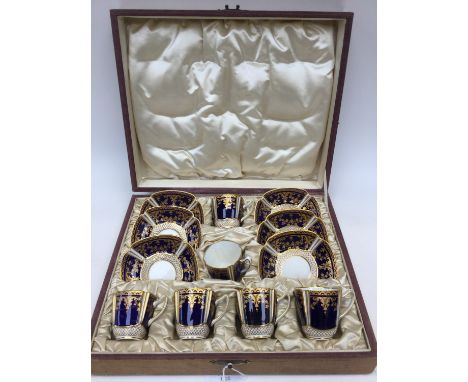 A case Copeland china coffee set, six cups and saucers, blue ground with gilt, Edwardian