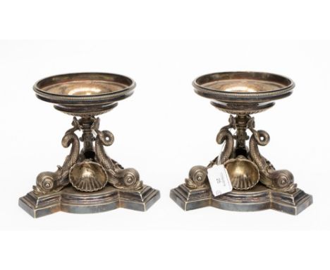 A pair of Georgian style silver plated tazza stands, having stepped bowl raised upon triple dolphin supports with scallop she