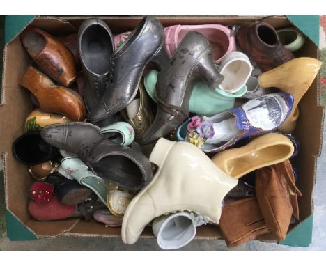 A collection of miniature shoes to include metal pin cushion, shoes and ceramic shoes (one box) 