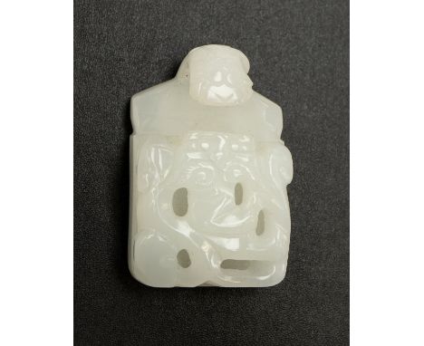 A Chinese pale jade coloured glass belt hook, archaistic style, fret carved, dragon head hook, height 5.5cm