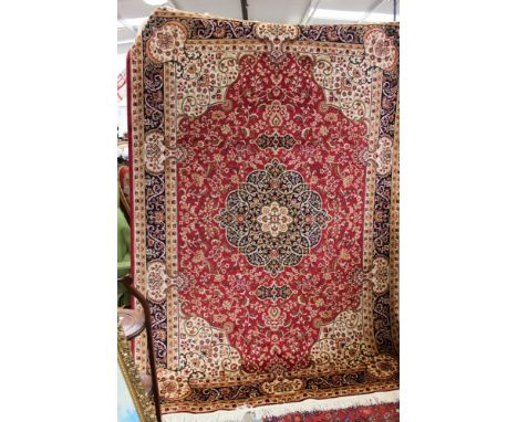 A red ground Keshan carpet, 2.80 by 2.00 approx 