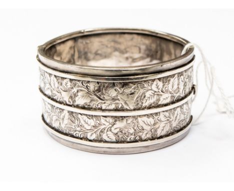 A Victorian silver bangle, width approx 32mm, internal dimension approx 55mm