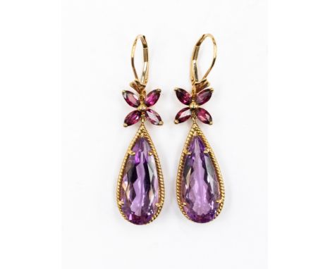 A pair of 9ct gold, amethyst and garnet drop earrings, comprising pear shaped amethysts, suspended from a marquise cute, garn