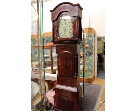 An early 19th Century eight day longcase clock, white enamelled dial, movephase, having turned columns to hood and turned col