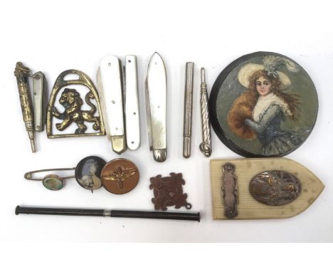 A silver backed pen/fruit knife with mother of pearl handle; together with three similar knives, propelling pencils, buttons,