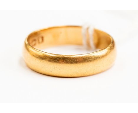 A 22ct gold wedding ring,  size O, weight approx  5.7gms