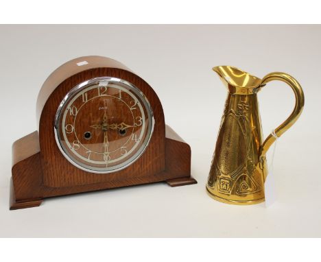 An Enfield oak cased mantel clock; a brass Art Nouveau jug (2) 