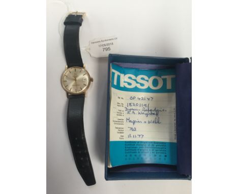 A gents gold Tissot Seastar Seven presentation watch, batons, date window and champagne dial, diameter approx 30mm, on leathe