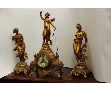 Early 20th century gilt clock with garnitures and case, French late 19th early 20th Century with marble decoration
