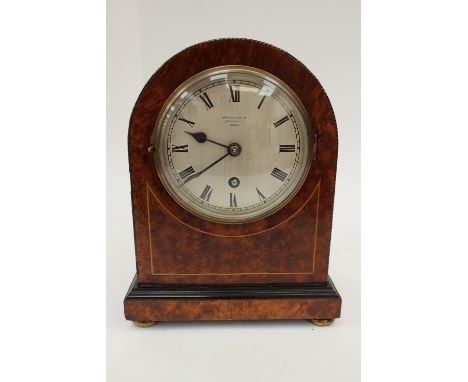An early 20th Century burr veneered eight day mantle clock, by Birch and Gaydon Ltd, Fenchurch Street, London                
