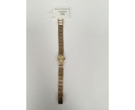 A 9ct gold gate link bracelet watch, H. Samuel, oval champagne dial, bracelet length 7'', with a total gross weight approx ap