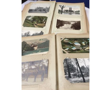 Postcards: collection in two early 20th Century albums, to include Edwardian real photographic topographical views/street sce