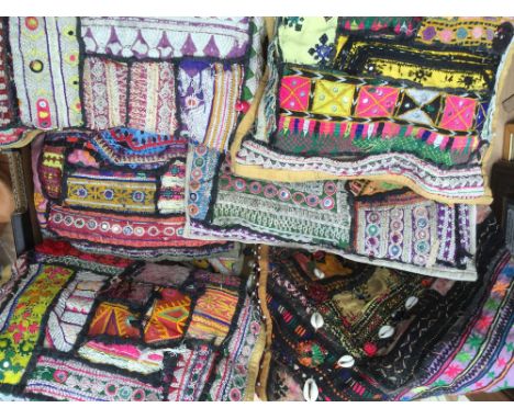 A collection of Pakistani Swat Valley cushions made with vintage textiles. The two large items are cushion covers decorated w