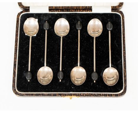 A cased set of six silver coffee bean finial coffee spoons, maker William Suckling, Birmingham 1931 