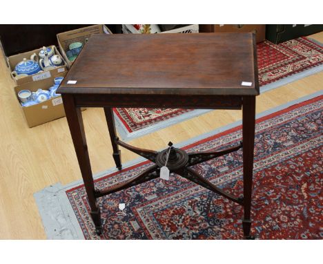 A late Victorian rosewood occasional table, of rectangular form blind fretwork frieze, standing on square tapered legs, with 