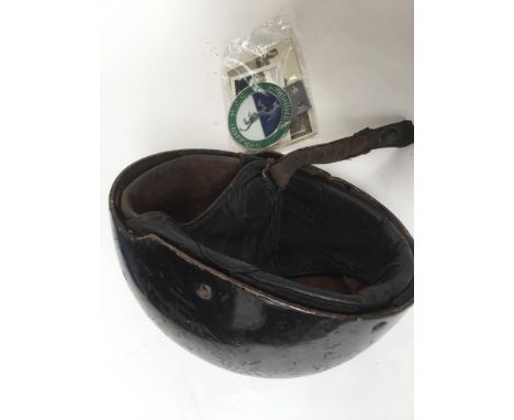 A Pyramid Display Team Motor Cycle Club fibre motorcycle helmet, circa 1950s in black with decal to front, along with enamel 