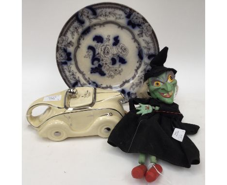 A 1963 Pelham puppet, an unusual 'witch' with original label, together with a Sadler 1930s car teapot and an early meign ston