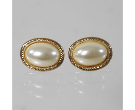 A pair of 9 carat gold pearl stud earrings