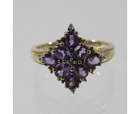 A 9 carat gold amethyst and diamond ring, boxed