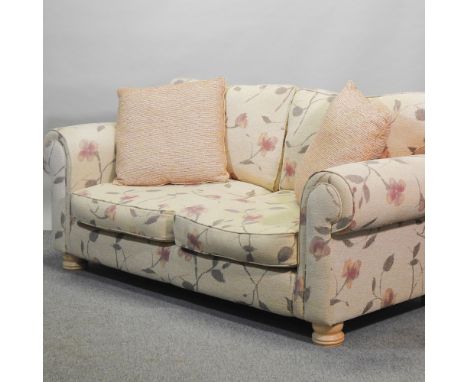 A modern floral upholstered sofa, 200cm