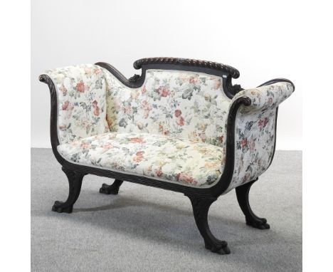 A continental mahogany floral upholstered scroll end sofa, on sabre legs, 143cm