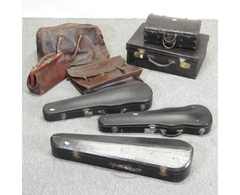 A collection of vintage cases, to include a small gladstone bag, 34cm, together with three violin cases