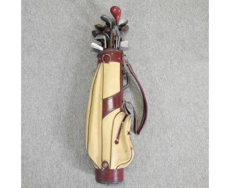 A collection of vintage golf clubs, in bag, with six wooden examples, to include Wingate, Robertson, Butchart and Special