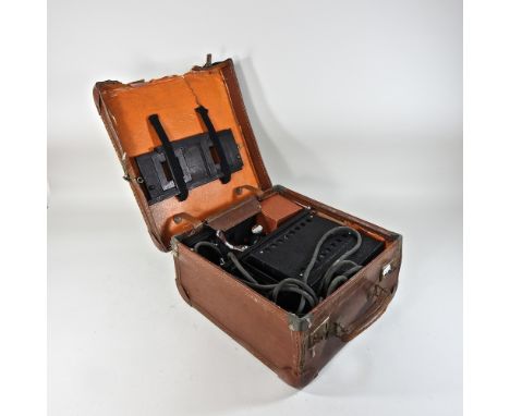 A large early 20th century magic lantern, cased, 33cm