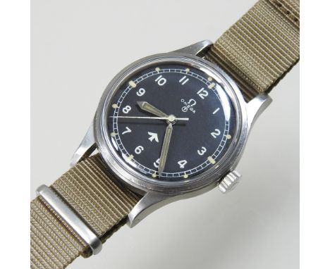 An Omega military vintage wristwatch, circa 1953, with a signed black dial, numbered 6645 101000 6B/542 157/53 to the case, o