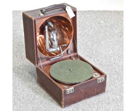 A vintage Decca patent portable record player, RD631877, in a travelling case, with internal horn, 30cm